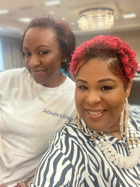 Kemi with an attendee