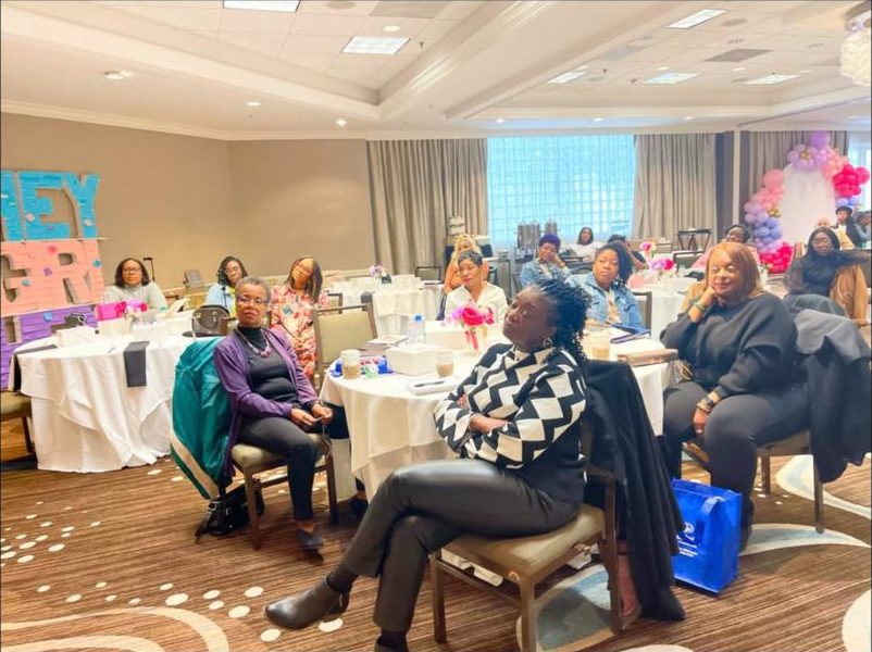 Women leaning in