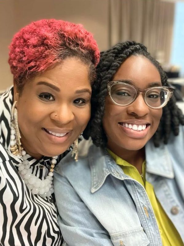 Kemi with an attendee